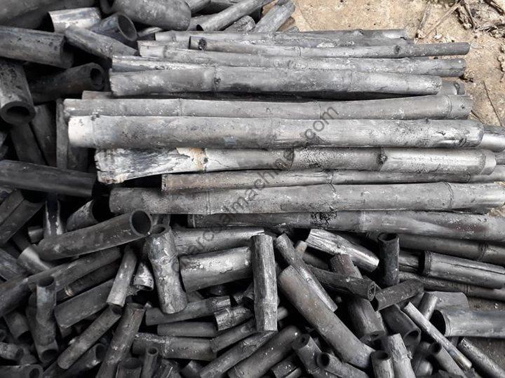 What is the processing profit for making 1 ton of bamboo charcoal?